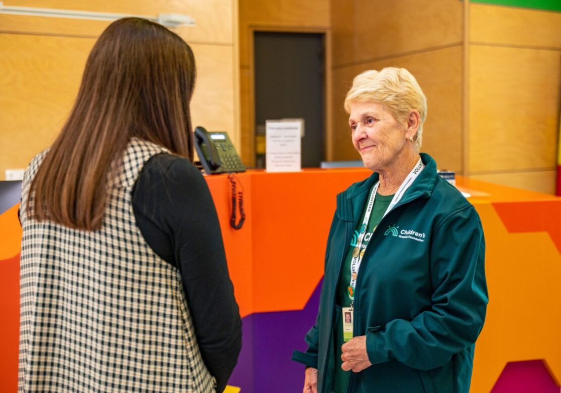 Margaret interacting with parent