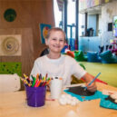 Raf draws with craft pack in Kidzone playroom