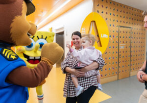 SpongeBob SquarePants and Chase from Paw Patrol meet a young patient during National Families Week